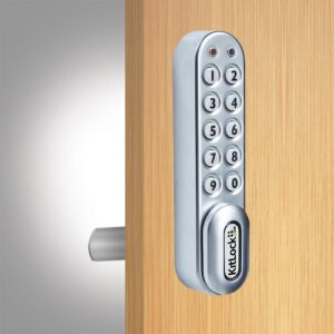 A silver kl1000 value line electronic lock fitted to a wooden locker door.
