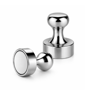 A picture of two magnets that are on a white background with one laying down on the surface.