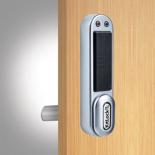 A silver and black kl1050 value electronic rfid lock on a wooden locker door.